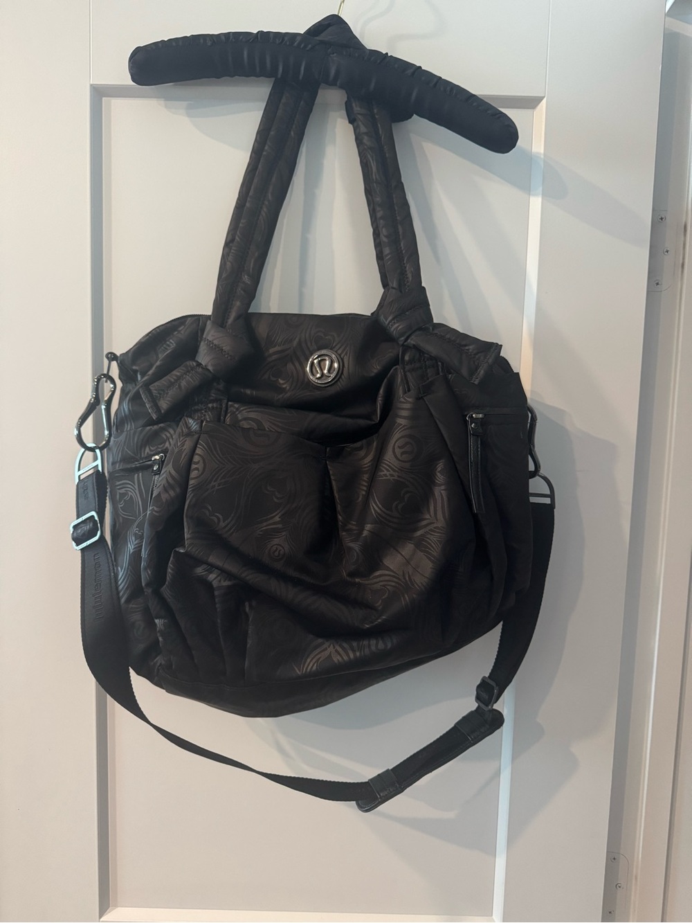 Lululemon Valley Triumph Tote- embossed tonal peacock swirl pattern.